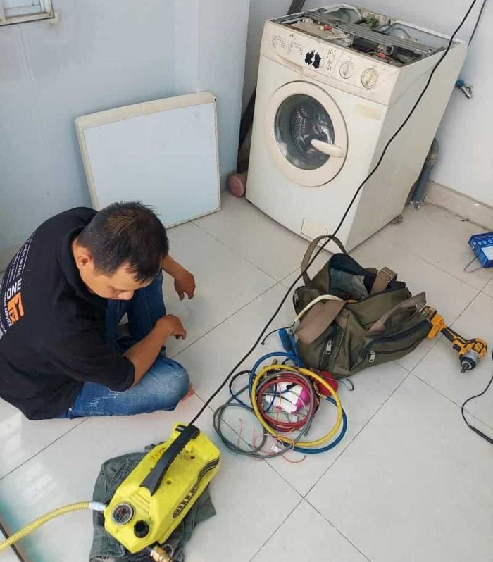 Cửa hàng sửa chữa máy giặt ở Bến Cát